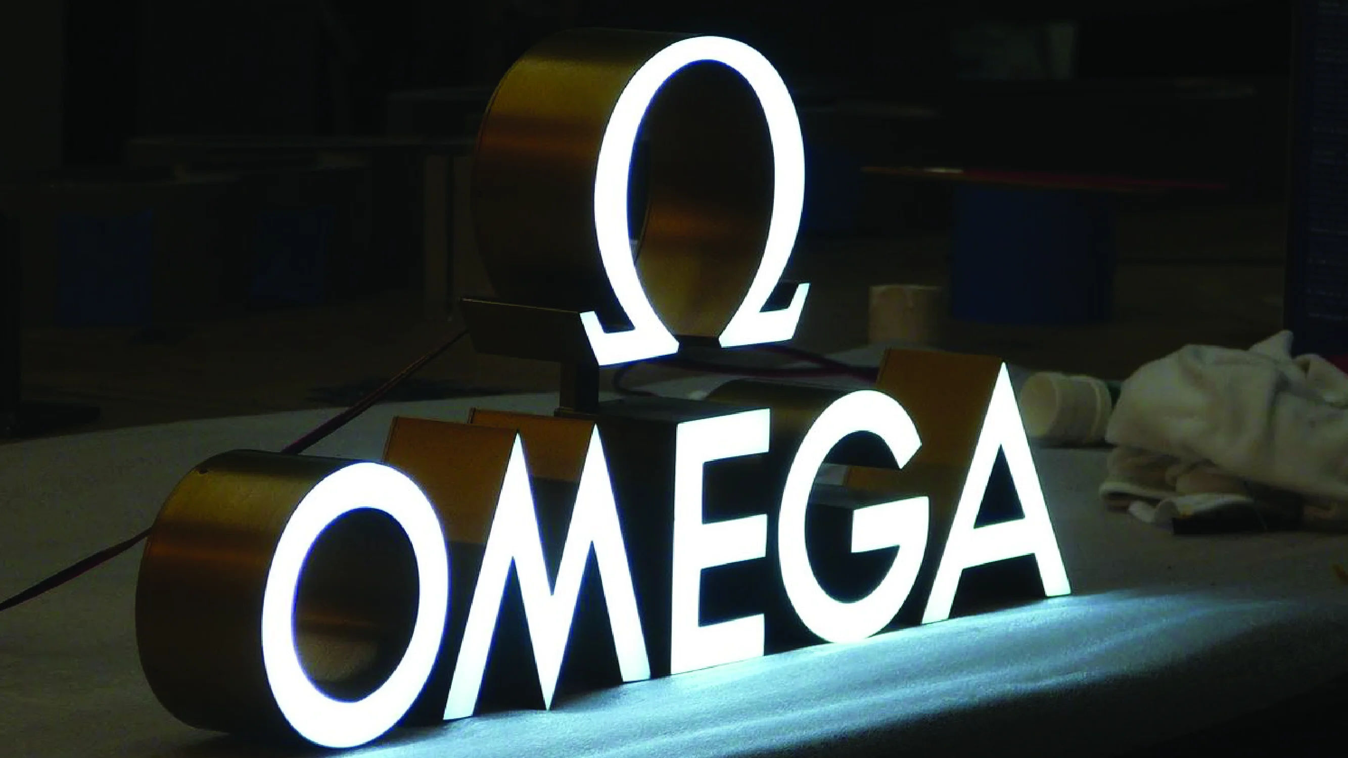 Omega 3D illuminated sign